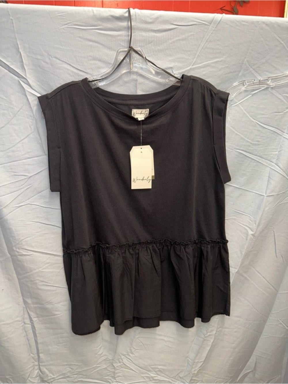 Wonderly Black Ruffle-Hem Sleeveless Top